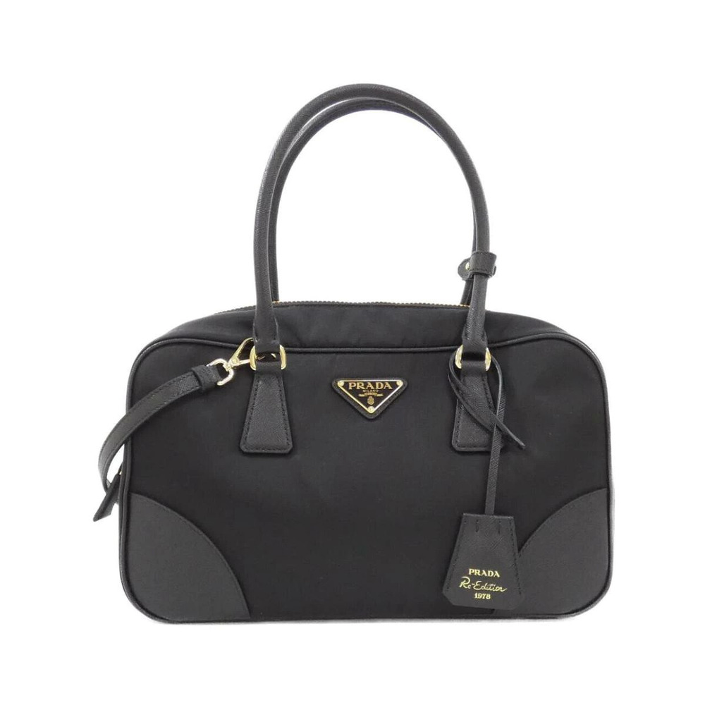 Prada ReEdition 1978 Bag signature enameled triangle logo